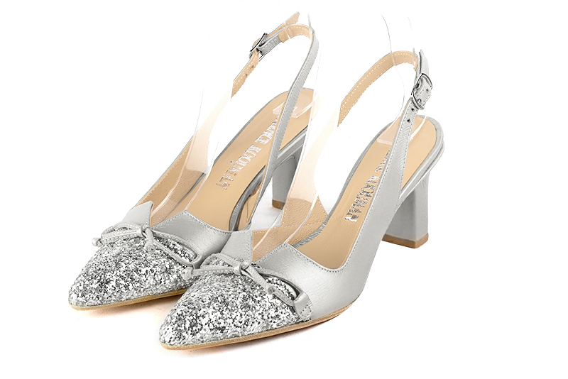 Light silver women's open back shoes, with a knot. Tapered toe. High slim heel. Front view - Florence KOOIJMAN
